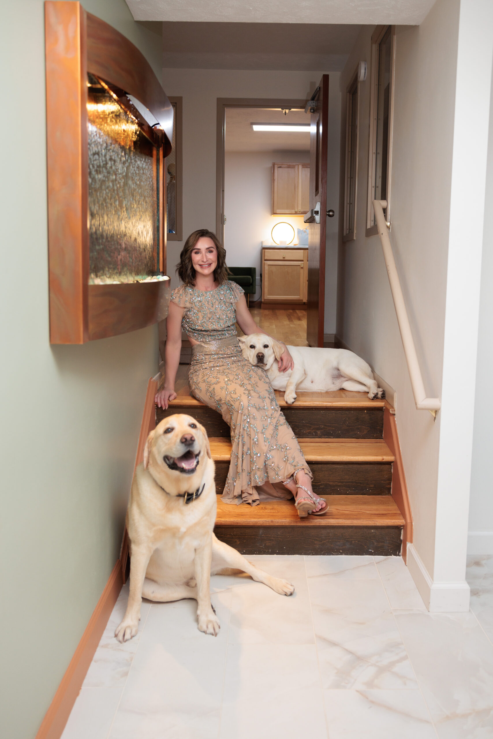 Lindsay Schweikarth, owner of Maverick Aesthetics in Murrysville, PA, with her dogs